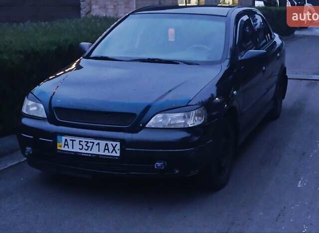 Черный Опель Астра, объемом двигателя 1.39 л и пробегом 214 тыс. км за 1800 $, фото 7 на Automoto.ua