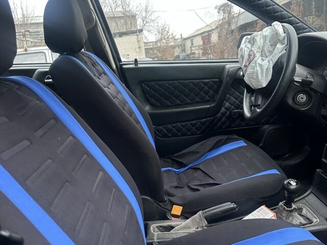 Черный Опель Астра, объемом двигателя 1.4 л и пробегом 150 тыс. км за 900 $, фото 5 на Automoto.ua