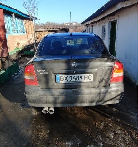 Черный Опель Астра, объемом двигателя 1.4 л и пробегом 230 тыс. км за 3100 $, фото 3 на Automoto.ua