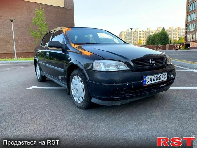 Черный Опель Астра, объемом двигателя 1.4 л и пробегом 270 тыс. км за 1750 $, фото 1 на Automoto.ua