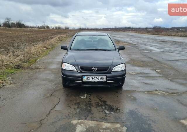 Черный Опель Астра, объемом двигателя 1.39 л и пробегом 280 тыс. км за 3300 $, фото 12 на Automoto.ua