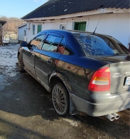 Черный Опель Астра, объемом двигателя 1.4 л и пробегом 230 тыс. км за 3100 $, фото 4 на Automoto.ua