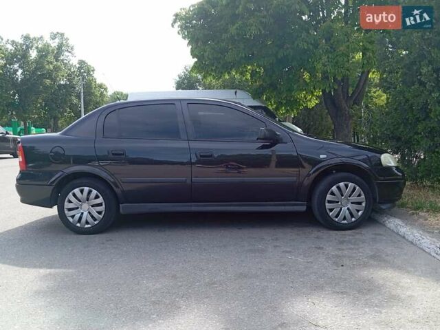 Чорний Опель Астра, об'ємом двигуна 1.36 л та пробігом 225 тис. км за 3790 $, фото 6 на Automoto.ua