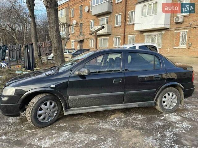 Черный Опель Астра, объемом двигателя 1.39 л и пробегом 280 тыс. км за 3300 $, фото 22 на Automoto.ua