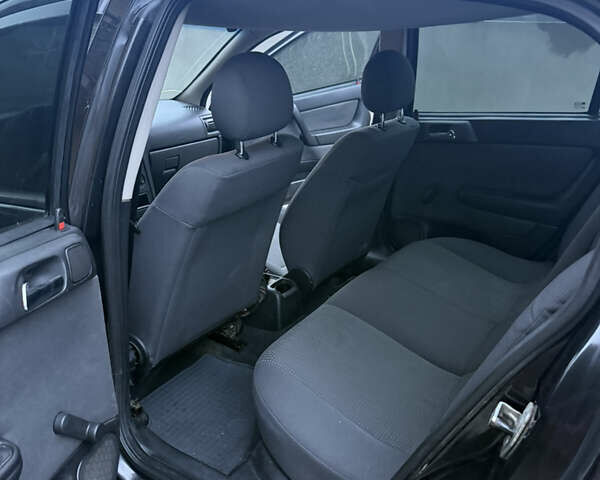 Черный Опель Астра, объемом двигателя 1.36 л и пробегом 260 тыс. км за 2900 $, фото 12 на Automoto.ua