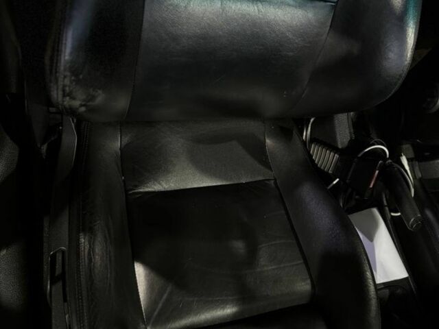 Черный Опель Астра, объемом двигателя 1.4 л и пробегом 215 тыс. км за 3500 $, фото 9 на Automoto.ua