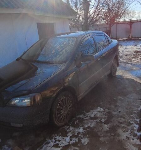 Черный Опель Астра, объемом двигателя 1.4 л и пробегом 230 тыс. км за 3100 $, фото 1 на Automoto.ua