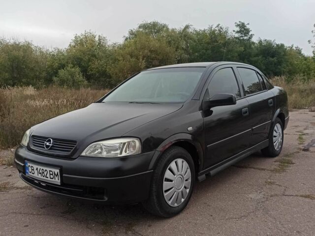 Черный Опель Астра, объемом двигателя 1.4 л и пробегом 282 тыс. км за 2000 $, фото 1 на Automoto.ua
