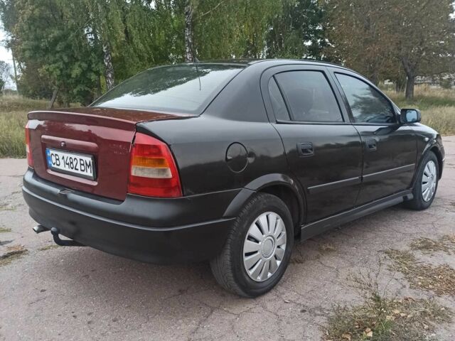 Черный Опель Астра, объемом двигателя 1.4 л и пробегом 282 тыс. км за 2000 $, фото 3 на Automoto.ua
