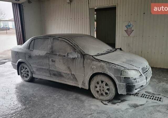 Черный Опель Астра, объемом двигателя 1.39 л и пробегом 280 тыс. км за 3300 $, фото 19 на Automoto.ua