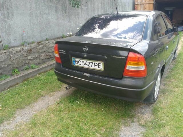 Черный Опель Астра, объемом двигателя 1.4 л и пробегом 243 тыс. км за 3200 $, фото 7 на Automoto.ua