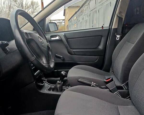 Черный Опель Астра, объемом двигателя 1.39 л и пробегом 214 тыс. км за 1800 $, фото 23 на Automoto.ua