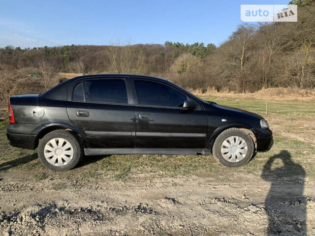 Чорний Опель Астра, об'ємом двигуна 1.4 л та пробігом 298 тис. км за 3000 $, фото 6 на Automoto.ua