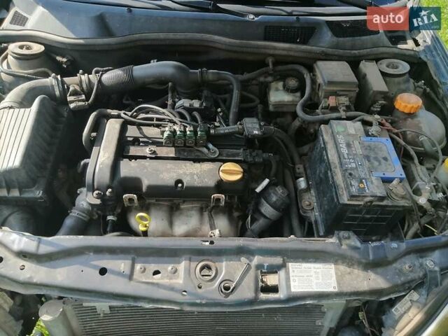 Черный Опель Астра, объемом двигателя 1.4 л и пробегом 250 тыс. км за 3000 $, фото 8 на Automoto.ua