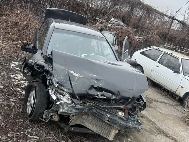 Черный Опель Астра, объемом двигателя 1.4 л и пробегом 150 тыс. км за 900 $, фото 1 на Automoto.ua