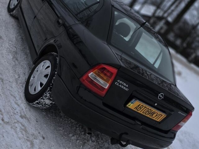 Черный Опель Астра, объемом двигателя 1.4 л и пробегом 184 тыс. км за 3900 $, фото 10 на Automoto.ua
