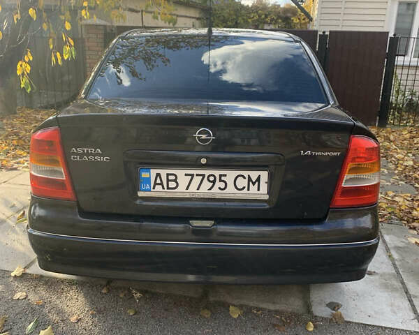 Черный Опель Астра, объемом двигателя 1.4 л и пробегом 216 тыс. км за 3500 $, фото 3 на Automoto.ua