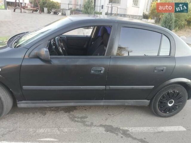 Черный Опель Астра, объемом двигателя 1.36 л и пробегом 330 тыс. км за 3600 $, фото 6 на Automoto.ua