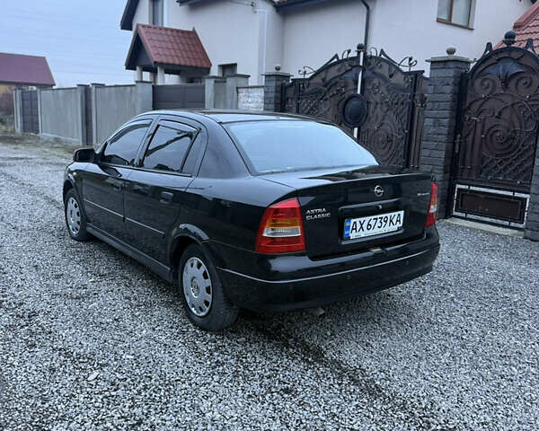 Черный Опель Астра, объемом двигателя 1.36 л и пробегом 260 тыс. км за 2900 $, фото 6 на Automoto.ua