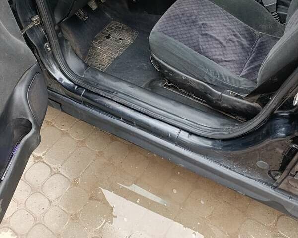 Черный Опель Астра, объемом двигателя 1.6 л и пробегом 147 тыс. км за 2700 $, фото 13 на Automoto.ua