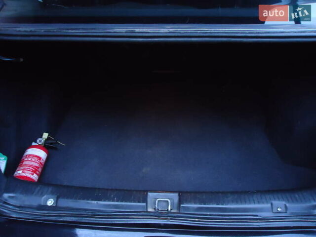 Черный Опель Астра, объемом двигателя 2 л и пробегом 300 тыс. км за 3500 $, фото 9 на Automoto.ua