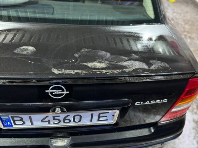 Черный Опель Астра, объемом двигателя 1.4 л и пробегом 215 тыс. км за 3500 $, фото 12 на Automoto.ua