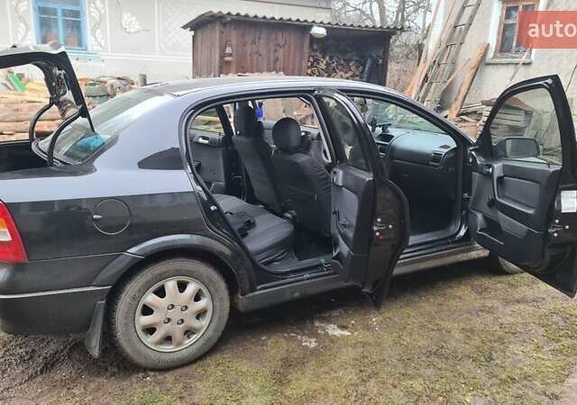 Черный Опель Астра, объемом двигателя 1.39 л и пробегом 280 тыс. км за 3300 $, фото 20 на Automoto.ua