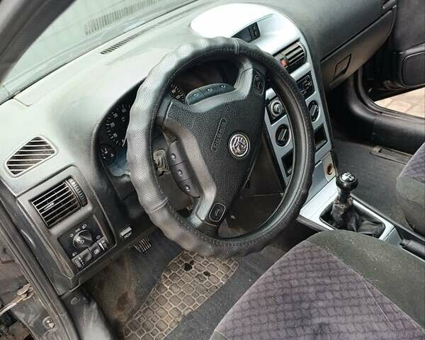 Черный Опель Астра, объемом двигателя 1.6 л и пробегом 147 тыс. км за 2700 $, фото 15 на Automoto.ua