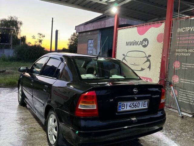 Черный Опель Астра, объемом двигателя 1.4 л и пробегом 215 тыс. км за 3500 $, фото 3 на Automoto.ua