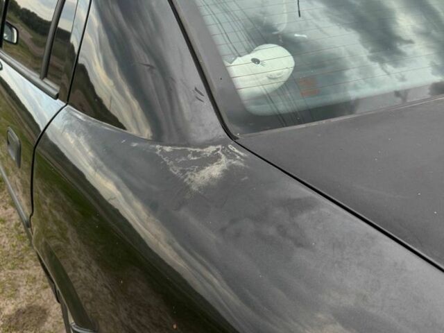 Черный Опель Астра, объемом двигателя 1.4 л и пробегом 215 тыс. км за 3500 $, фото 13 на Automoto.ua