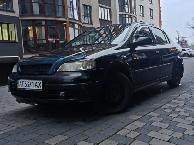 Черный Опель Астра, объемом двигателя 1.4 л и пробегом 214 тыс. км за 1800 $, фото 9 на Automoto.ua