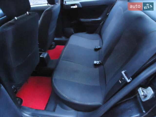 Черный Опель Астра, объемом двигателя 2 л и пробегом 300 тыс. км за 3500 $, фото 6 на Automoto.ua