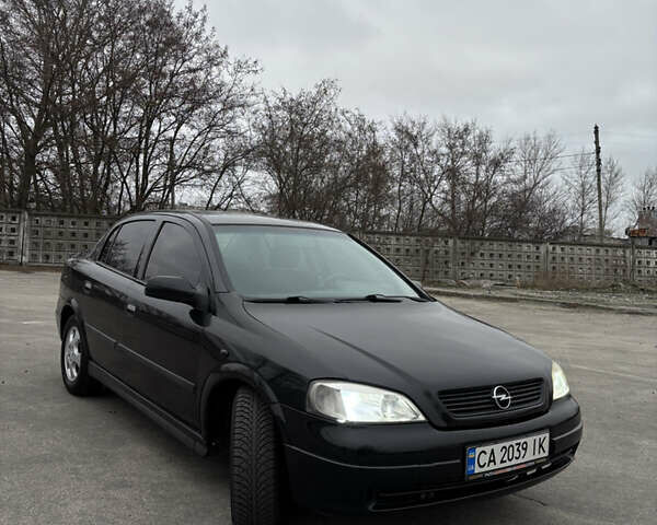 Черный Опель Астра, объемом двигателя 2 л и пробегом 300 тыс. км за 3800 $, фото 2 на Automoto.ua