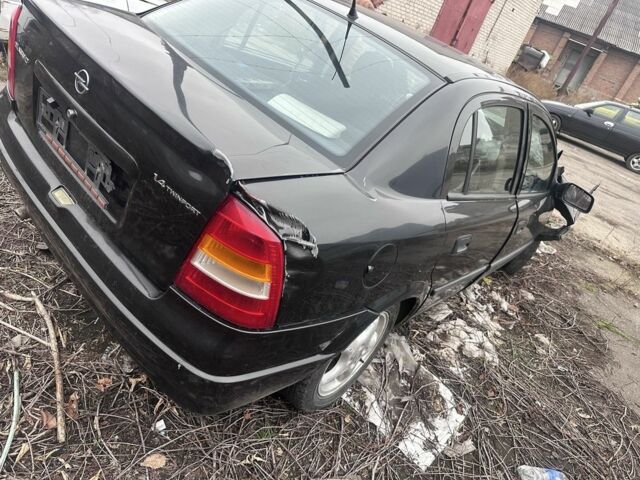 Черный Опель Астра, объемом двигателя 1.4 л и пробегом 150 тыс. км за 900 $, фото 4 на Automoto.ua