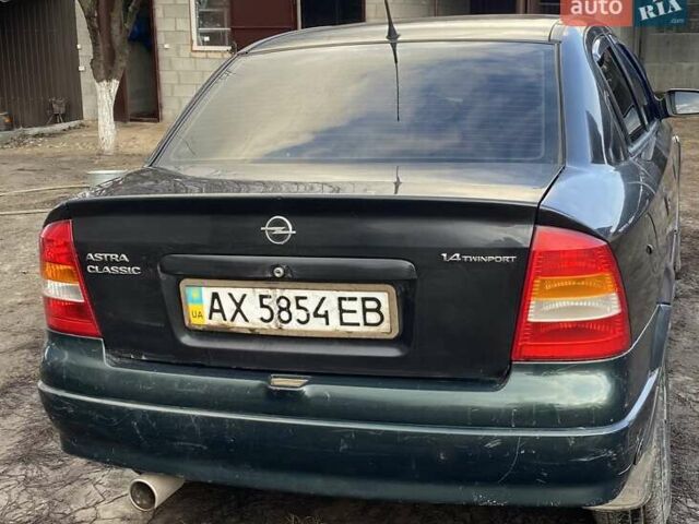 Черный Опель Астра, объемом двигателя 1.4 л и пробегом 380 тыс. км за 3200 $, фото 5 на Automoto.ua