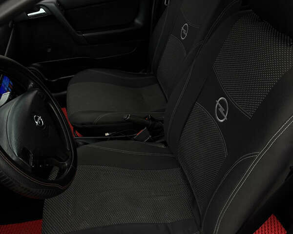 Черный Опель Астра, объемом двигателя 2 л и пробегом 300 тыс. км за 3800 $, фото 6 на Automoto.ua