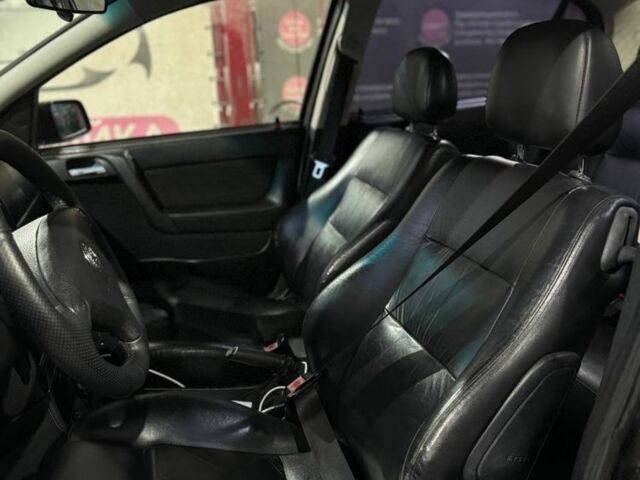Черный Опель Астра, объемом двигателя 1.4 л и пробегом 215 тыс. км за 3500 $, фото 6 на Automoto.ua