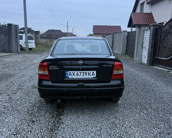 Черный Опель Астра, объемом двигателя 1.36 л и пробегом 260 тыс. км за 2900 $, фото 5 на Automoto.ua