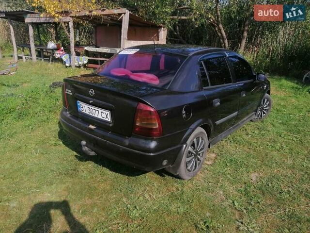 Черный Опель Астра, объемом двигателя 1.4 л и пробегом 250 тыс. км за 3000 $, фото 10 на Automoto.ua