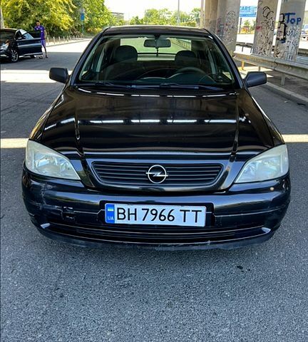 Черный Опель Астра, объемом двигателя 1.4 л и пробегом 140 тыс. км за 3300 $, фото 4 на Automoto.ua