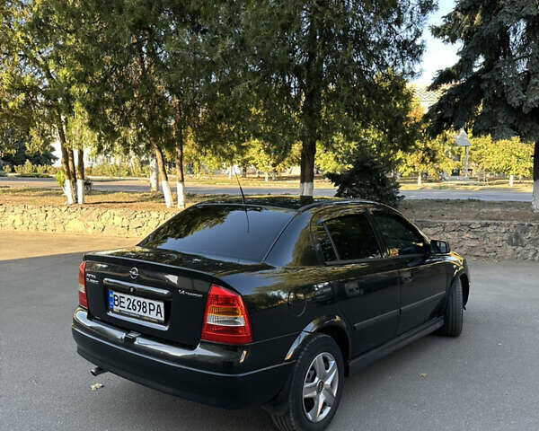 Черный Опель Астра, объемом двигателя 1.4 л и пробегом 212 тыс. км за 4200 $, фото 9 на Automoto.ua