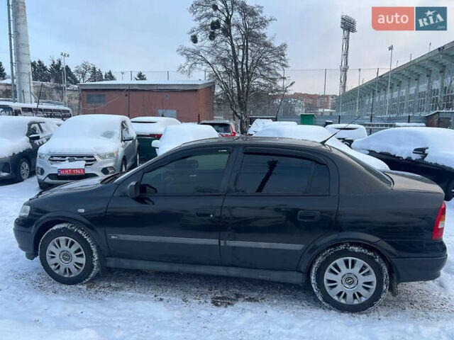 Черный Опель Астра, объемом двигателя 1.36 л и пробегом 170 тыс. км за 4300 $, фото 3 на Automoto.ua