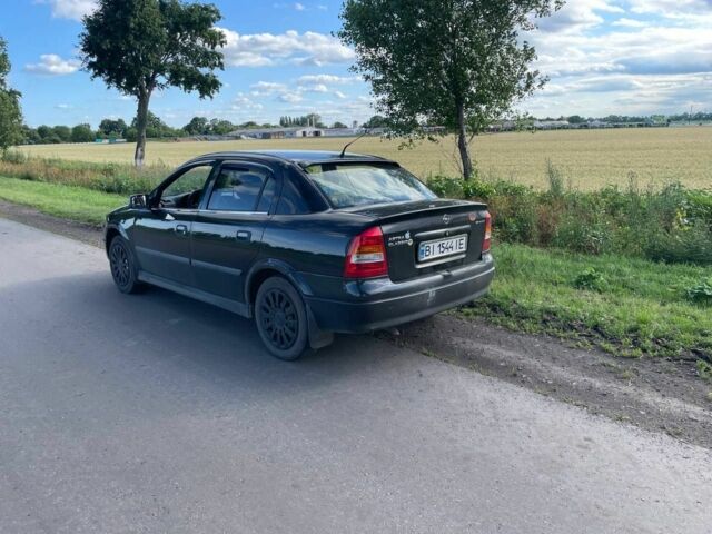 Черный Опель Астра, объемом двигателя 1.4 л и пробегом 294 тыс. км за 3800 $, фото 6 на Automoto.ua