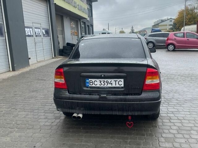 Черный Опель Астра, объемом двигателя 1.36 л и пробегом 215 тыс. км за 2750 $, фото 5 на Automoto.ua