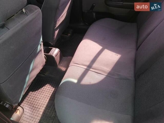 Черный Опель Астра, объемом двигателя 1.4 л и пробегом 250 тыс. км за 3000 $, фото 7 на Automoto.ua