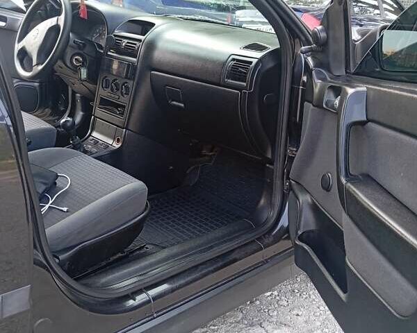 Чорний Опель Астра, об'ємом двигуна 1.36 л та пробігом 225 тис. км за 3790 $, фото 7 на Automoto.ua