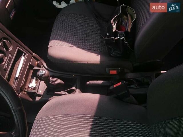 Черный Опель Астра, объемом двигателя 1.4 л и пробегом 250 тыс. км за 3000 $, фото 4 на Automoto.ua