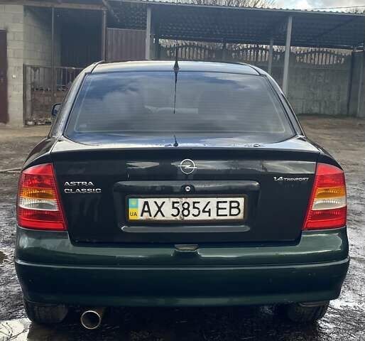 Черный Опель Астра, объемом двигателя 1.4 л и пробегом 380 тыс. км за 3200 $, фото 3 на Automoto.ua