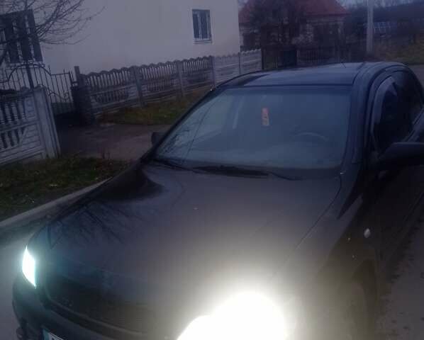 Чорний Опель Астра, об'ємом двигуна 1.39 л та пробігом 215 тис. км за 2999 $, фото 1 на Automoto.ua