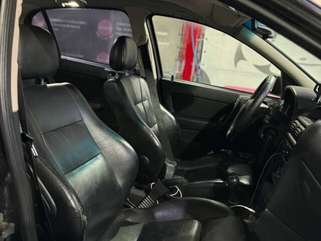 Черный Опель Астра, объемом двигателя 1.4 л и пробегом 215 тыс. км за 3500 $, фото 8 на Automoto.ua